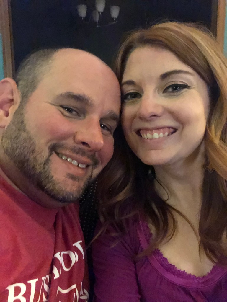 A couple smiling together.